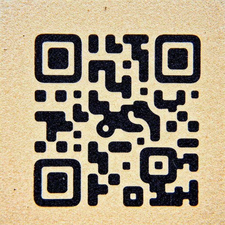 macro photo of QR code on corrugated brown cardboard, high detail